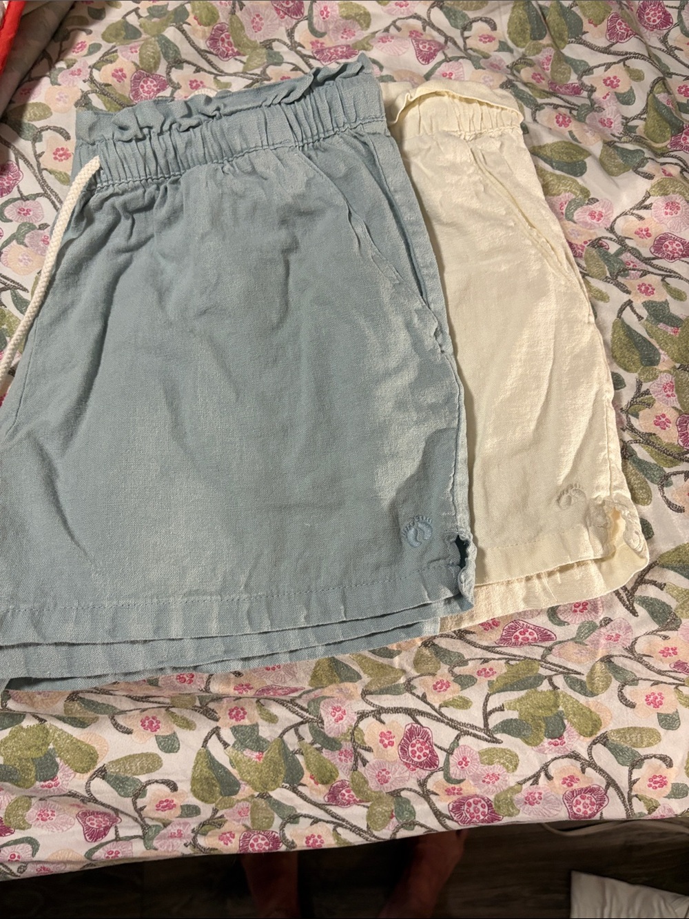 Two pairs of Hang Ten Women's Light Blue and Cream Linen-Blend Shorts.